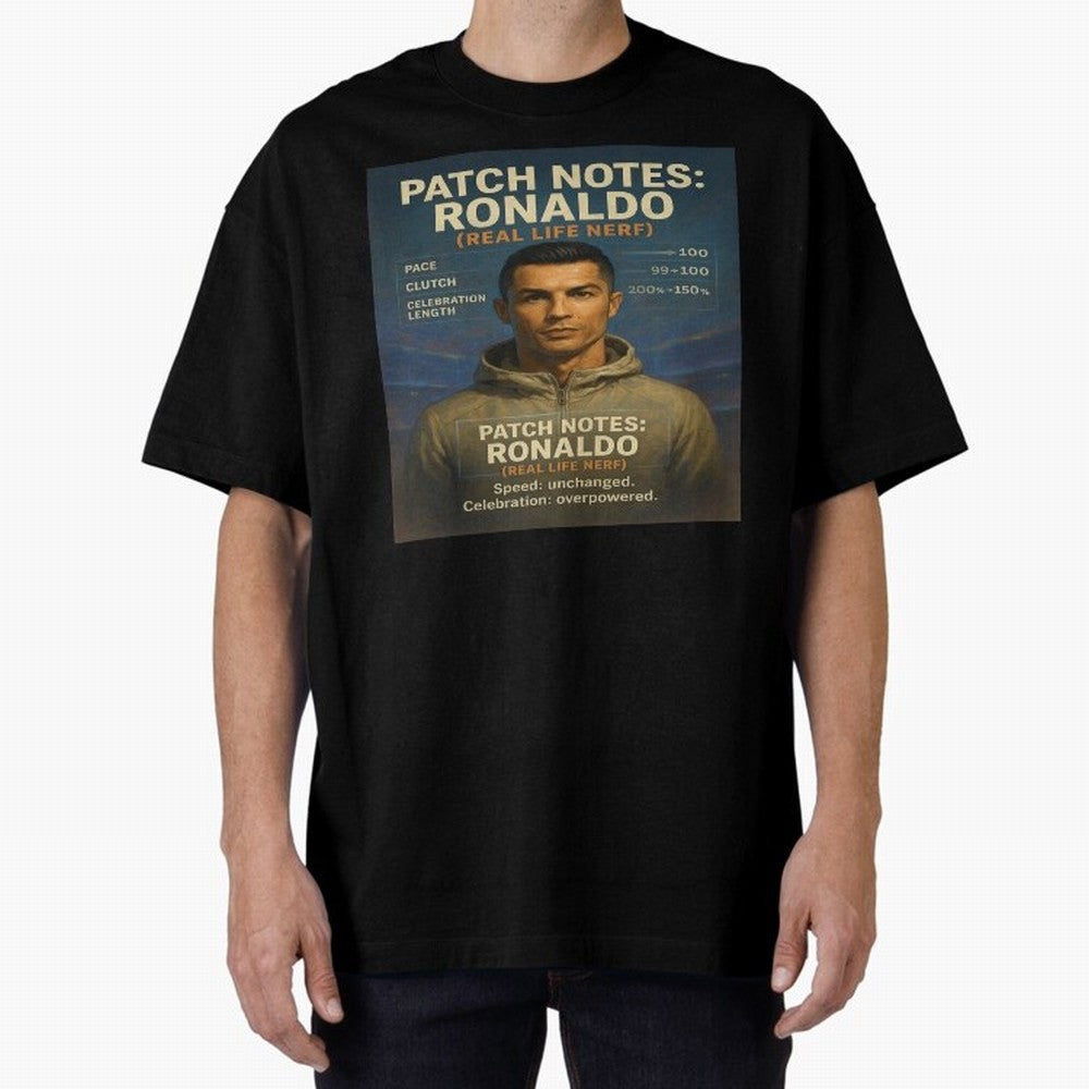 Patch Notes Cristiano Ronaldo ¡ª Real Life Nerf Football Gamer Oversized T-Shirt Celebrate the Magic of the FIFA World Cup 2026 Journey through Messi and Cristiano Ronaldo Highlights, Brazil Pride, Goal Celebration Energy, Supporter Heritage,