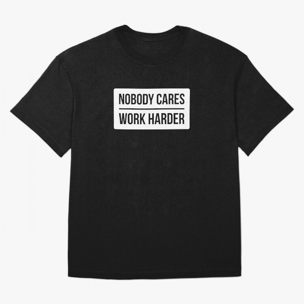Nobody Cares Work Harder (White Rectangle Design) Oversized T-Shirt Celebrate Golden Goal Energy in Match Day Hype around FIFA World Cup 2026 USA Canada Mexico, Messi, England, France and Netherlands, Football History, Final Match Energy, Crowd